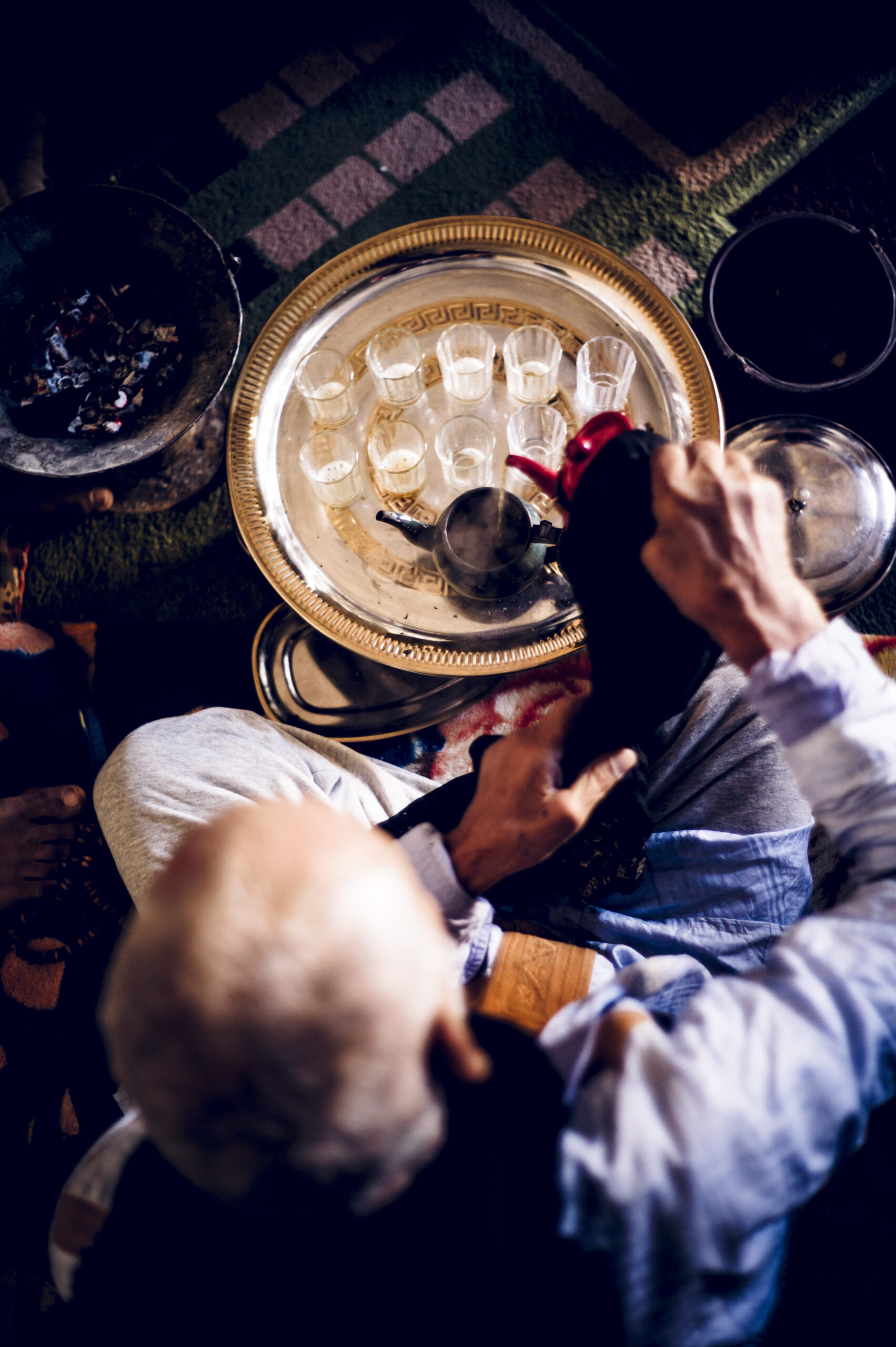 Senior man in Smara refugee camp preparing tea, Tindouf, Algeria